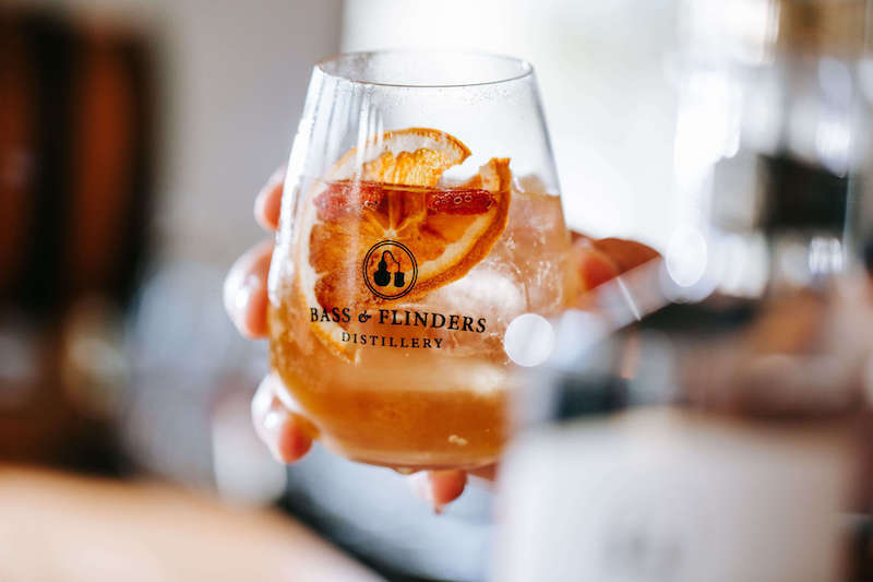 Bass & Flinders Distillery Mornington Peninsula gin and tonic cocktail with orange garnish